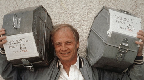 Wolfgang Petersen with the film rolls of the director's cut of 'Das Boot' in 1997