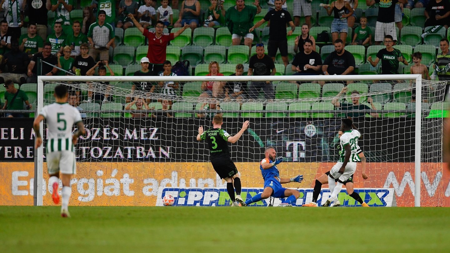 Mats Knoester of Ferencvarosi TC competes for the ball with