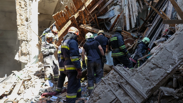 Search and rescue works are carried out after a missile hit a building in Kharkiv