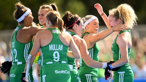 Niamh Carey, right, is congratulated by team-mates after opening the scoring against Turkey