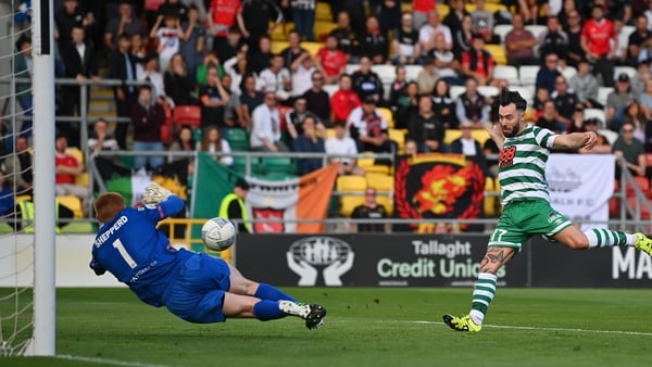 Richie Towell shoots to score his side's second goal