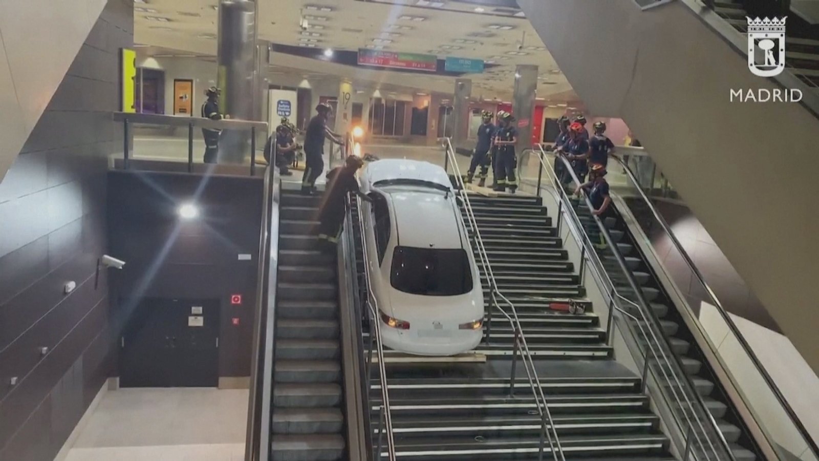 Stolen car pulled up stairs in Madrid station