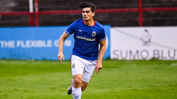Jimmy Callacher's own goal in the last minute of extra-time took the tie to penalties