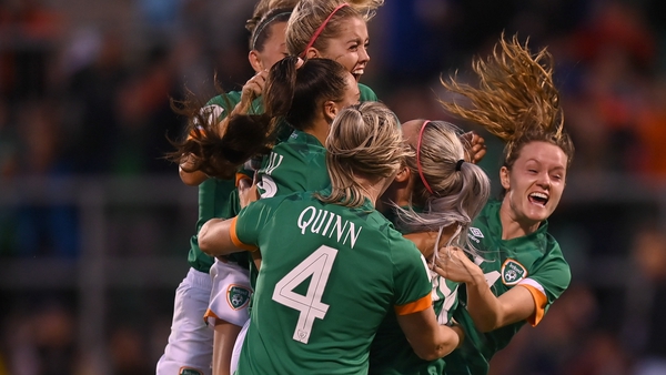 Republic of Ireland players mob Lily Agg after her winner