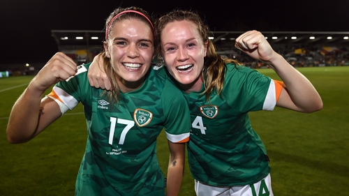 Jamie Finn (L) and Heather Payne celebrating Ireland win against Finland