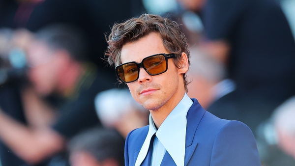 Harry Styles cause quite the reaction when he walked the red carpet in Venice