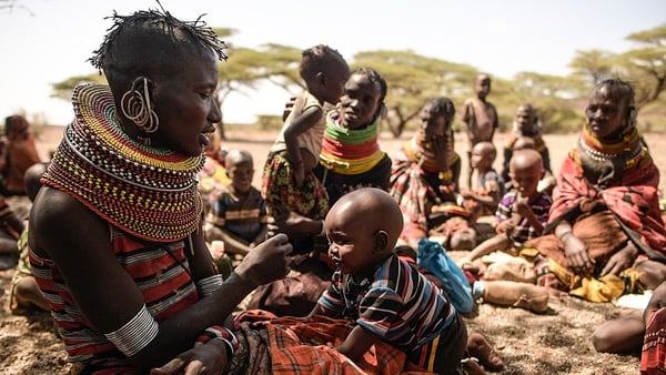 Villagers, mostly women and children, gather in Purapul village in Marsabit to attend a mobile clinic
