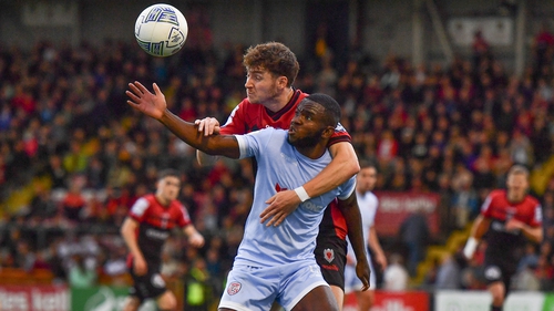 James Akintunde of Derry tries to hold off Bohs' Rory Feely at Dalymount back in July