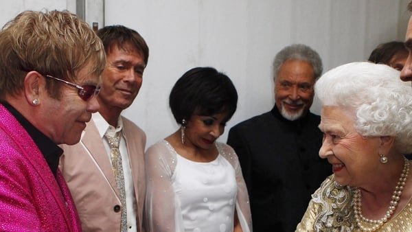 Queen Elizabeth II meets Elton John after the Diamond Jubilee Buckingham Palace Concert on 4 June 2012 in London