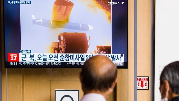 People watch a news broadcast with file footage of a North Korean missile test, at a railway station in Seoul last month (File image)