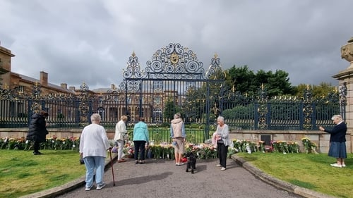 People have been leaving flowers at Hillsborough Castle since the death of Queen Elizabeth was announced