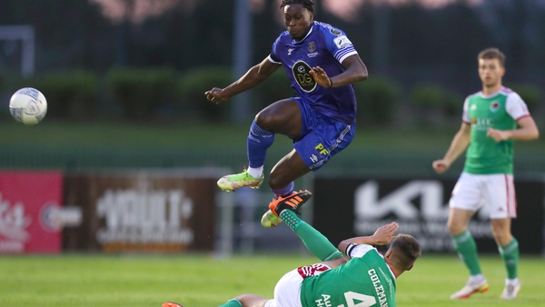 Tunmise Sobowale of Waterford is tackled by Cian Coleman of Cork City