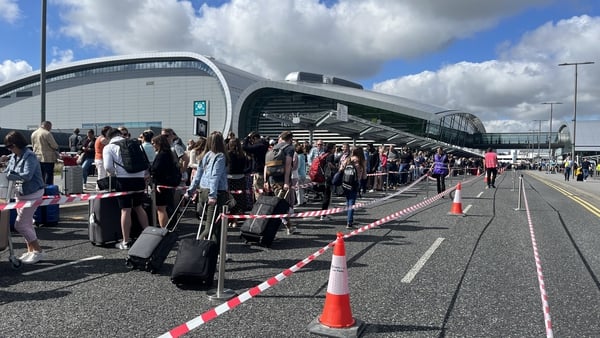 Queues of passengers outside Dublin Airport earlier this year
