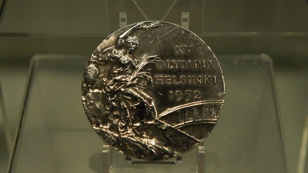 John McNally's silver medal won in the bantamweight boxing competition at the 1952 Helsinki Olympic Games