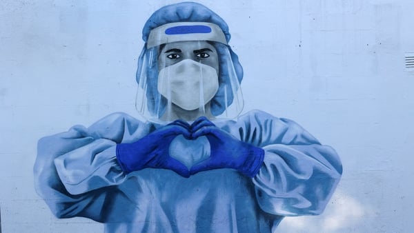 A mural depicting a nurse dressed in Personal Protective Equipment on a Dublin wall (Pic: RollingNews.ie)