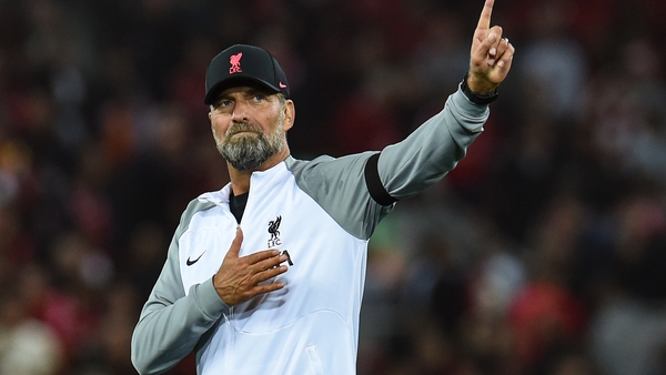 Jurgen Klopp salutes the crowd after Liverpool's win