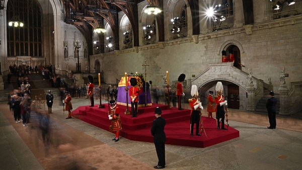 Members of the public file past the coffin of Queen Elizabeth II, inside Westminster Hall