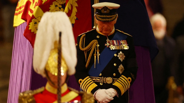 King Charles III standing vigil at the coffin