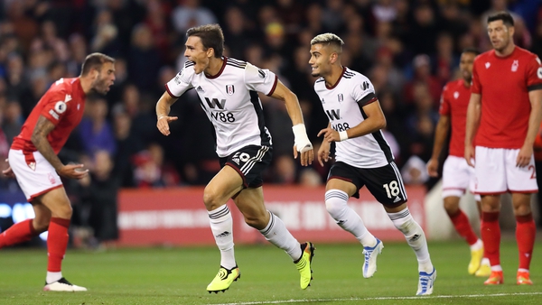 Joao Palhinha wheels away in celebration after making it 2-1 to Fulham