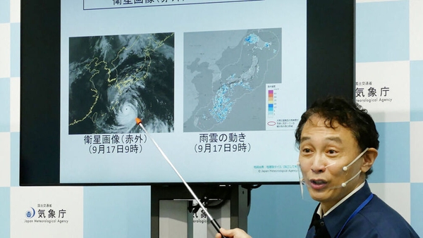 A director of Japan Meteorological Agency's Forecast Division holds a press conference on Typhoon Nanmadol in Tokyo today