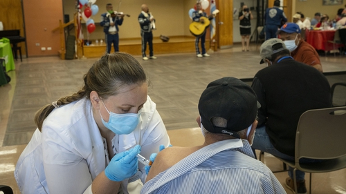 Residents of the Southwest Senior Center in Chicago receive their Covid vaccine
