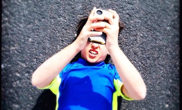 Kids with too much screen time may have less refreshing sleep (Alamy/PA)