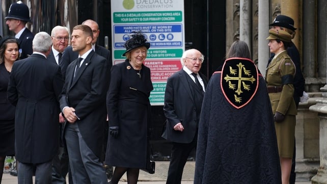 President Michael D Higgins and his wife Sabina Higgins arriving at the funeral today (Peter Byrne/PA)