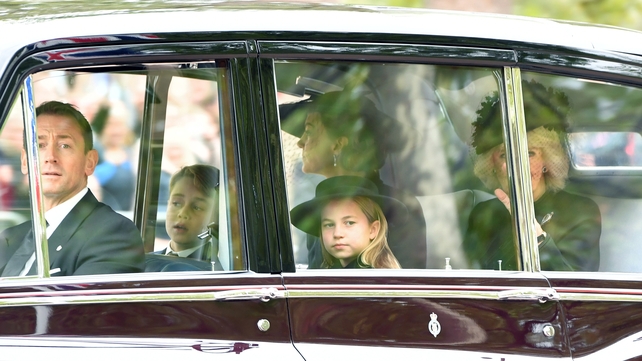 Catherine, the Princess of Wales, and Queen Consort Camilla travel in the funeral procession with Prince George and Princess Charlotte (Anthony Devlin/Getty)