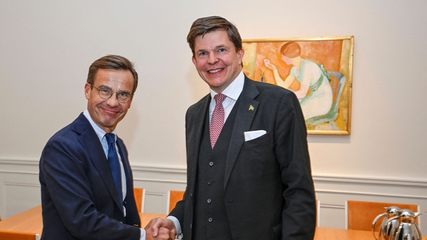 Sweden's Moderate Party leader Ulf Kristersson (L) and the Speaker of the Parliament, Andreas Norlen