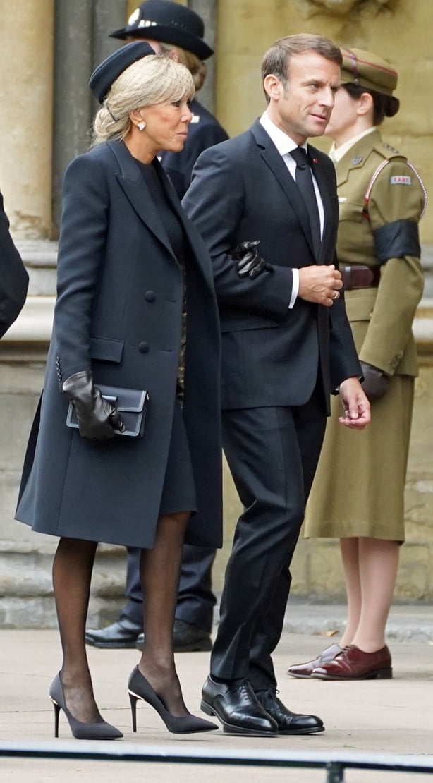 French President Emanuel Macron and his wife Brigitte (James Manning/PA)