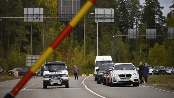 Cars coming from Russia wait in lines at the border checkpoint between Russia and Finland near Vaalimaa