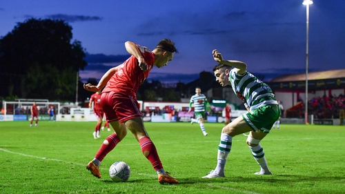 Shelbourne's Matty Smith in action against Gary O'Neill of Shamrock Rovers