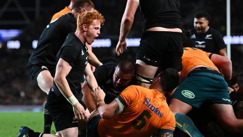 Finlay Christie of the All Blacks celebrates the try scored by Samisoni Taukei'aho