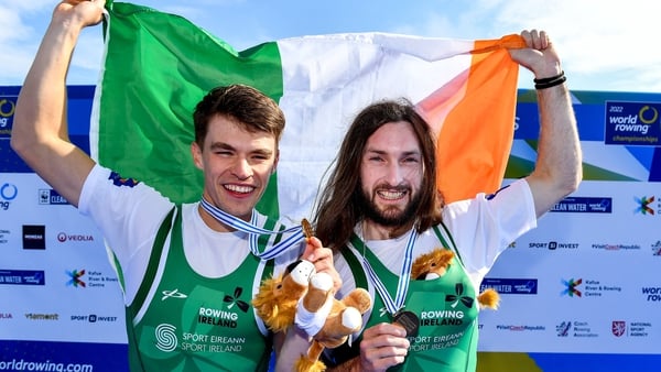 Fintan McCarthy, left, and Paul O'Donovan of Ireland celebrate with their gold medals