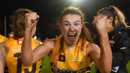 Aileen Gilroy of the Hawks celebrates victory following the round five AFLW match