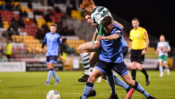Shamrock Rovers striker Rory Gaffney and UCD's Michael Gallagher battle for the ball during the teams' February meeting on the season's opening night