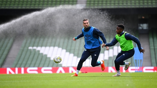 Shane Duffy and Chiedozie Ogbene training on a well-watered Lansdowne Road track ahead of the Armenia match