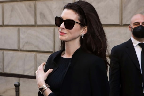 Anne Hathaway arriving at Armani fashion show