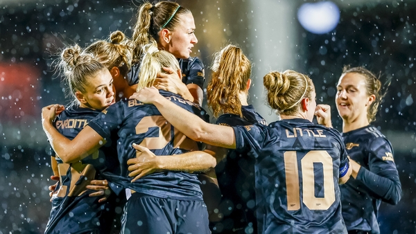 Vivianne Miedema is mobbed after her crucial goal