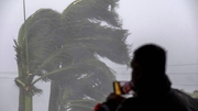 A man live streams as gusts from Hurricane Ian hits in Punta Gorda, Florida