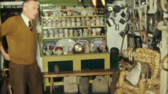 Publican Pat Cassidy with his collection of folk artefacts in the Corner Bar Lisnaskea, County Fermanagh, 1977.