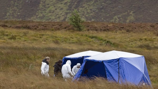 Police tents with forensics officers at an area being searched on Saddleworth Moor, in northwest England