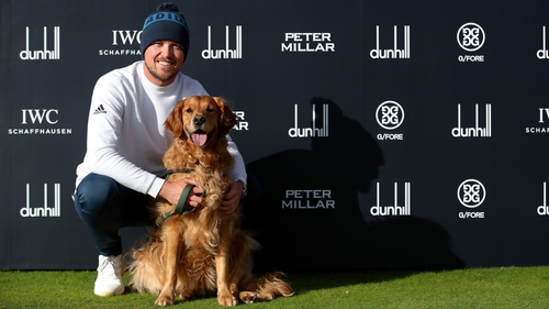 Richard Mansell with his dog Arnie after his round