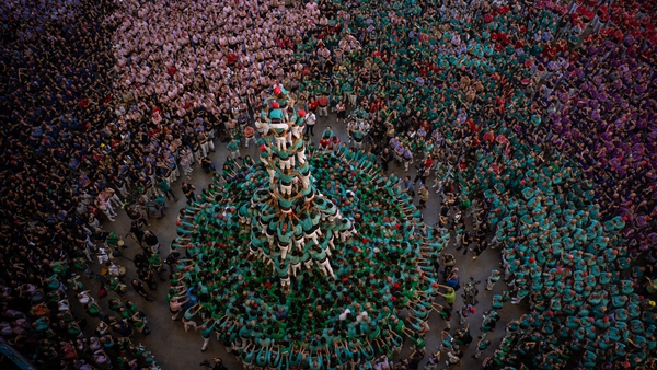 Members of the 'Castellers de Vilafranca' build their human tower