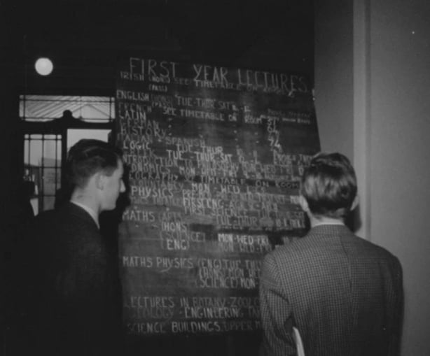 Students check their timetables at UCD, Earlsfort Terrace, Dublin (1962)