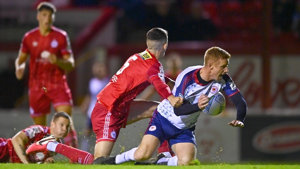 Eoin Doyle is fouled by Shelbourne's Shane Griffin for one of the away side's penalties