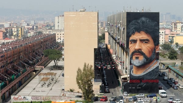 A giant Maradona mural painted by the artist Jorit overlooks San Giovanni a Teduccio in Napoli. Photo: Marco Cantile/LightRocket via Getty Images