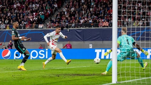 Andre Silva fires home Leipzig's third