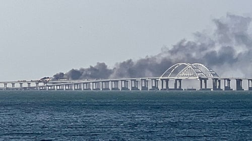 Thick black smoke rising from a fire on the Kerch bridge that links Crimea to Russia