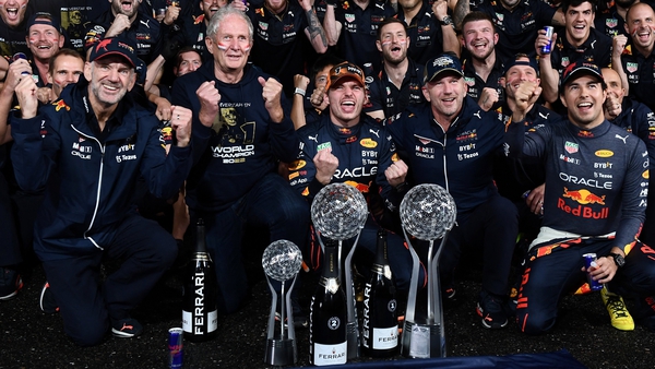 Japanese Grand Prix race winner and 2022 F1 world champion Max Verstappen celebrates with members of his team